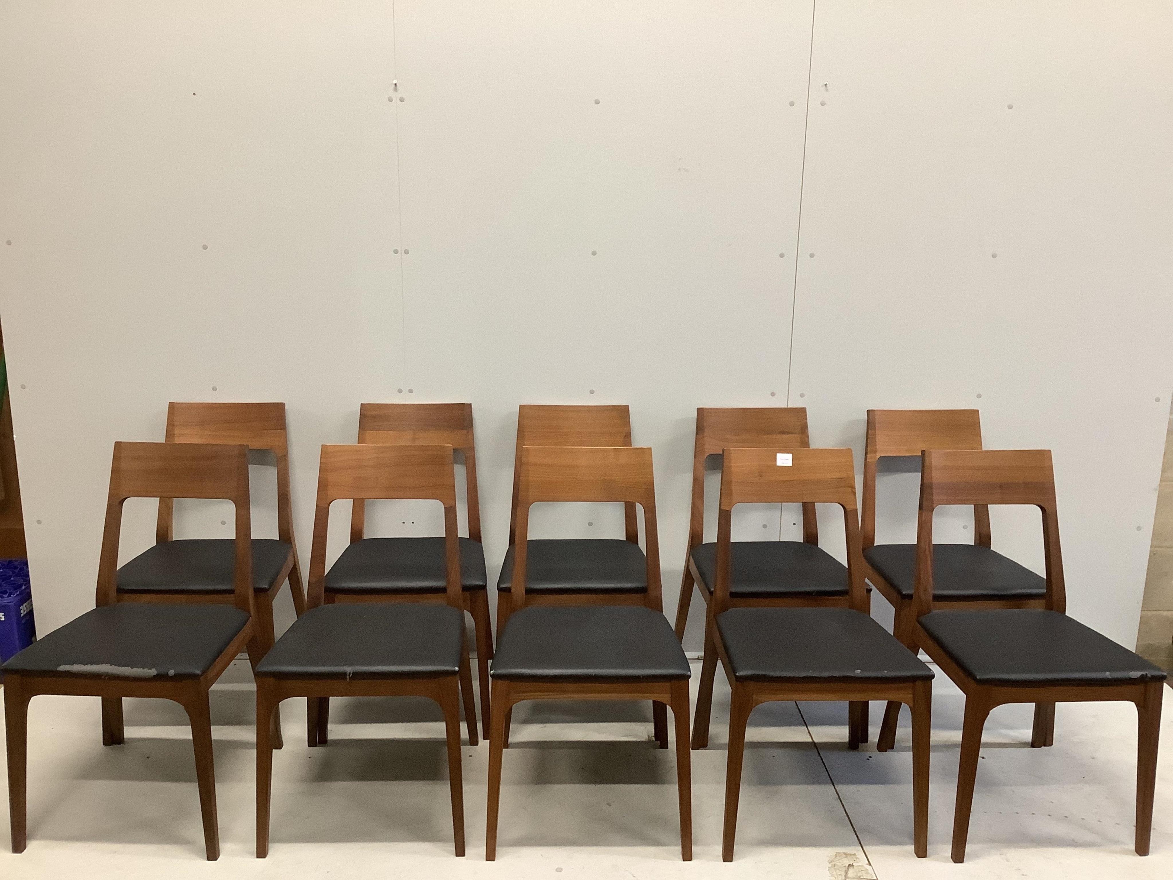 A Contemporary American black walnut dining table and ten chairs, by Chartwood designs Ltd, width 300cm, depth 120cm, height 75cm. Condition - fair